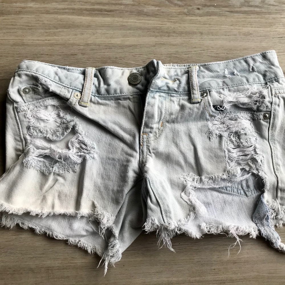 Destroyed light wash denim shorts